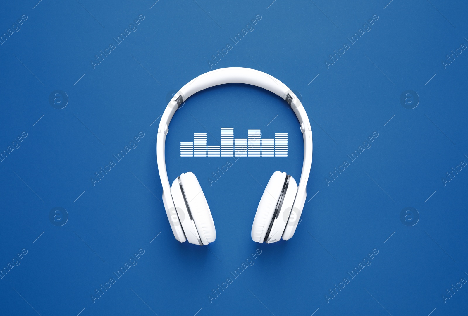 Image of Headphones and sound waves on blue background, top view