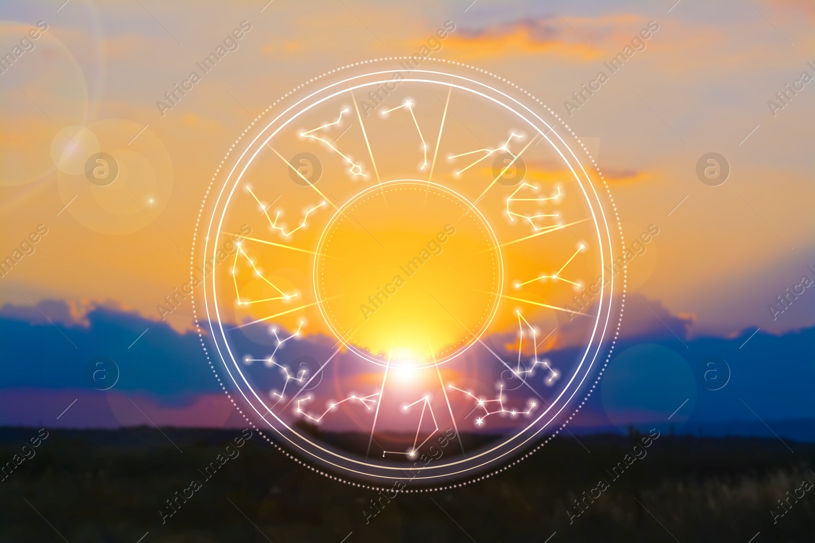 Zodiac wheel with constellation patterns against nature landscape Image of Zodiac wheel with constellation patterns against nature landscape