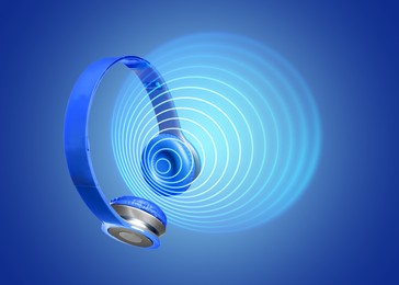 Image of Headphones and sound waves against blue gradient background