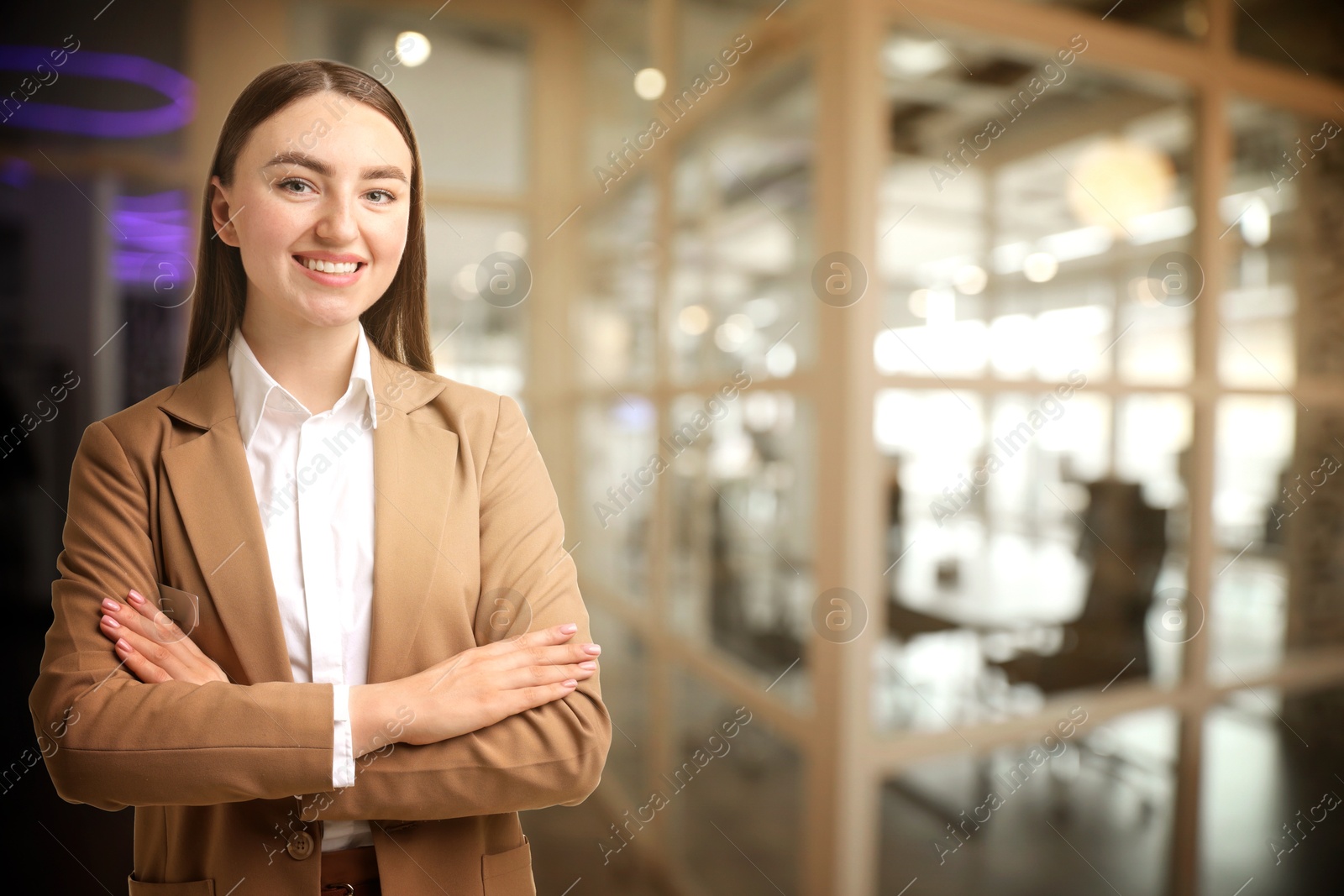 Young hostess near conference room. Space for text Image of Young hostess near conference room. Space for text