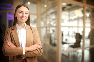 Image of Young hostess near conference room. Space for text