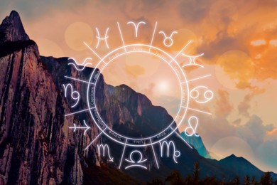 Image of Zodiac wheel with signs against mountain landscape