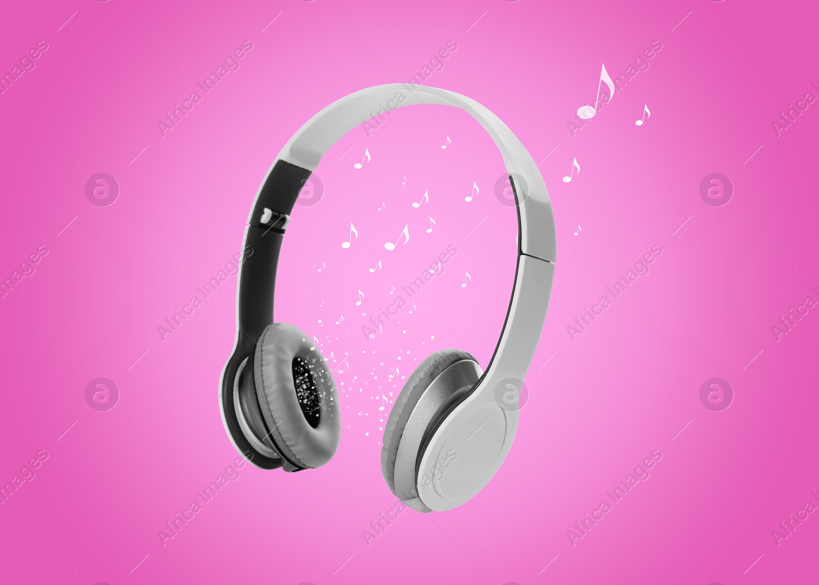 Image of Headphones and music notes against pink gradient background