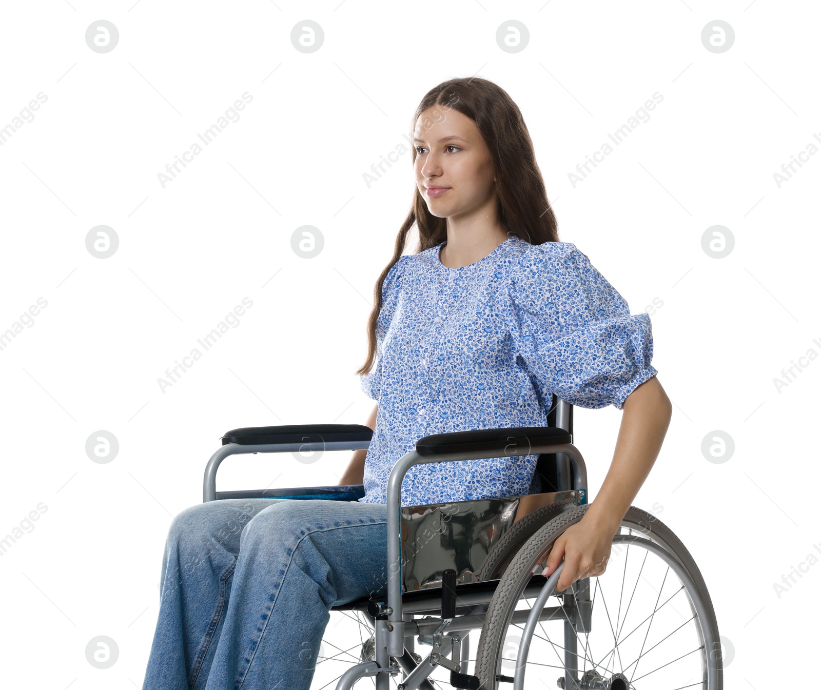 Photo of Beautiful teenage girl in wheelchair on white background