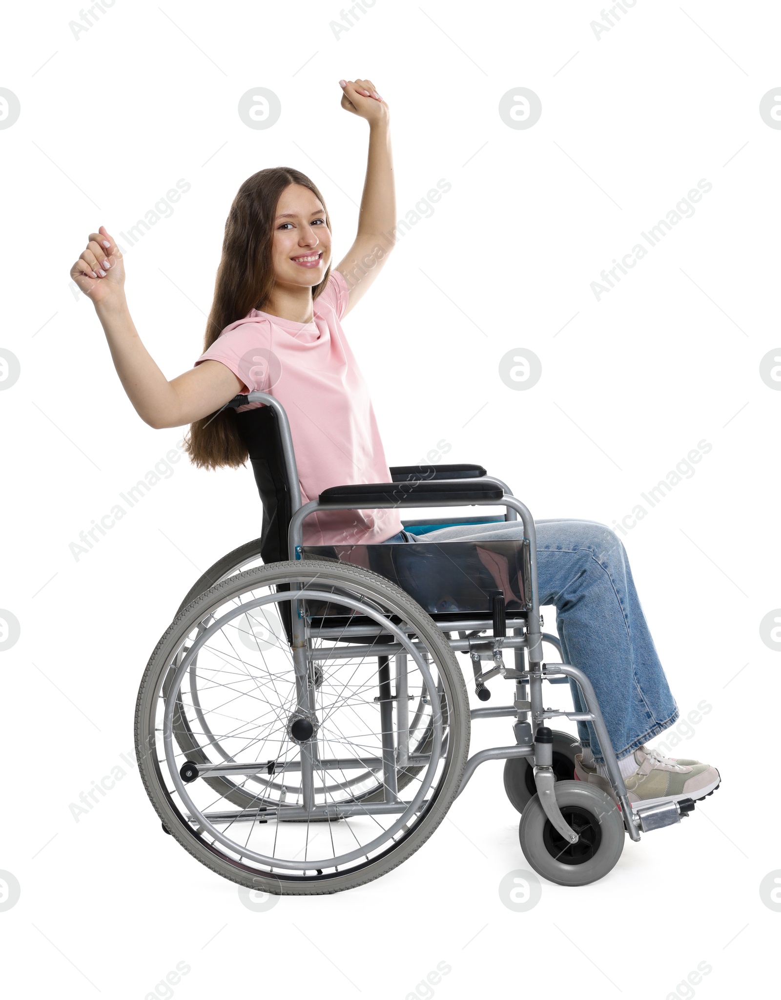 Photo of Smiling teenage girl in wheelchair on white background