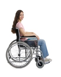 Photo of Smiling teenage girl in wheelchair on white background