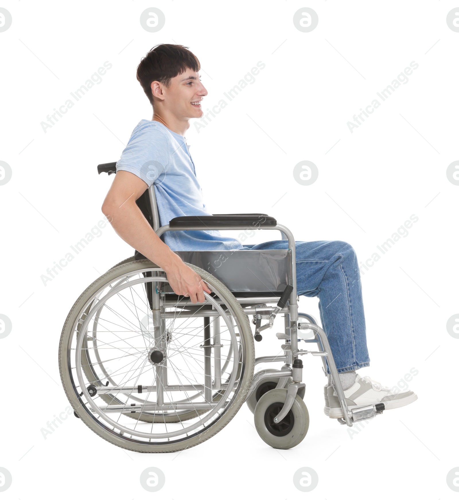 Photo of Happy young man in modern wheelchair on white background