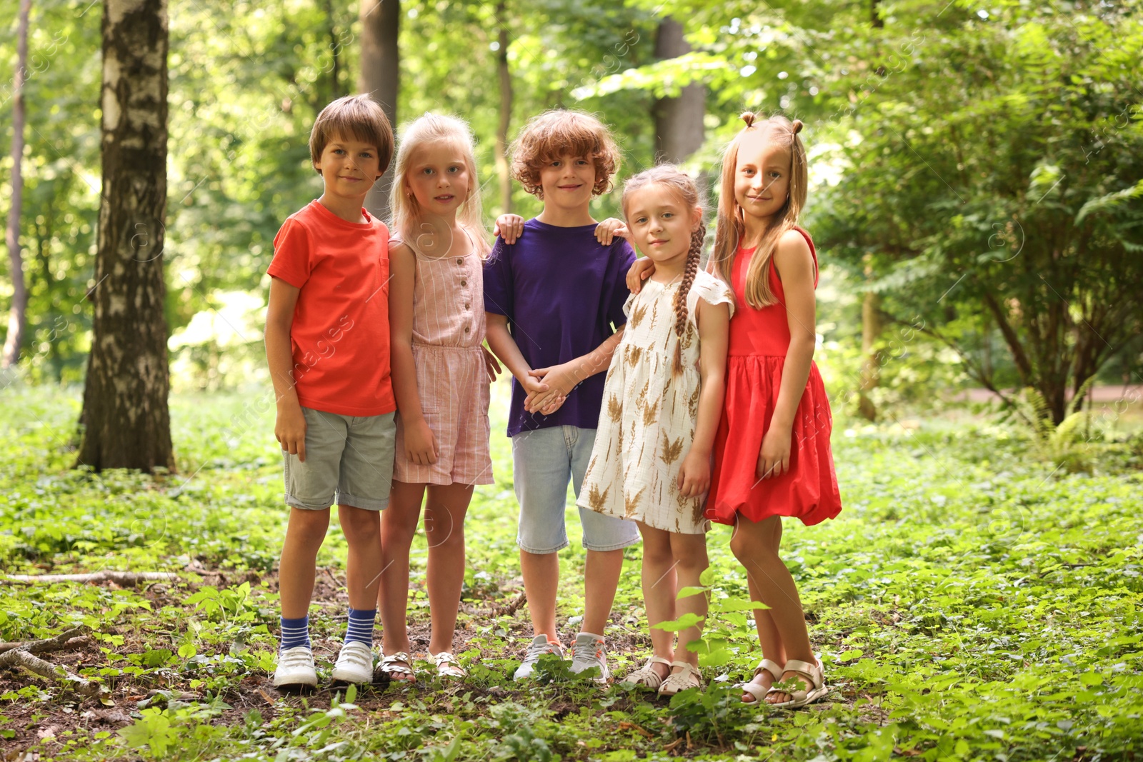 Photo of Group of cute little kids in park