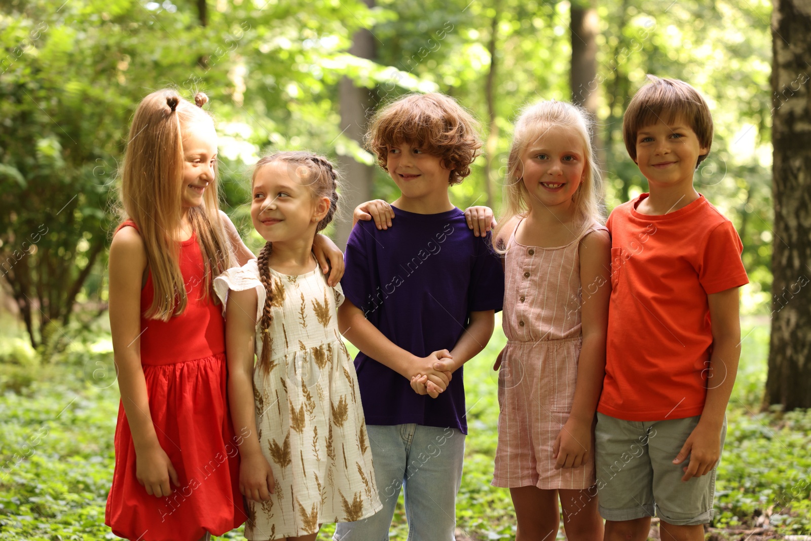 Photo of Group of cute little kids in park