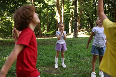 Photo of Cute little kids having fun together in park