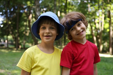 Photo of Portrait of cute little kids in park