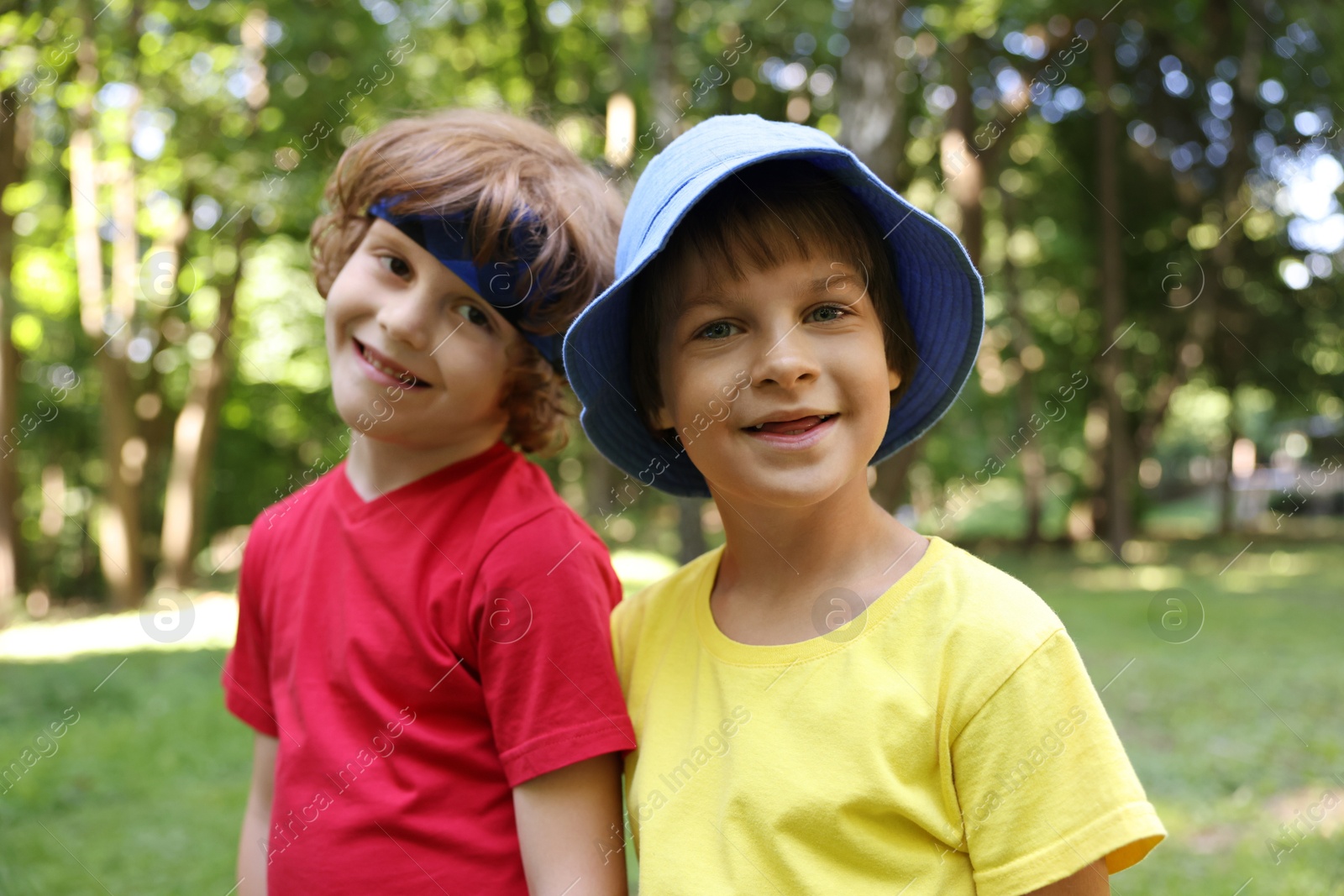 Photo of Portrait of cute little kids in park