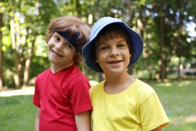 Photo of Portrait of cute little kids in park