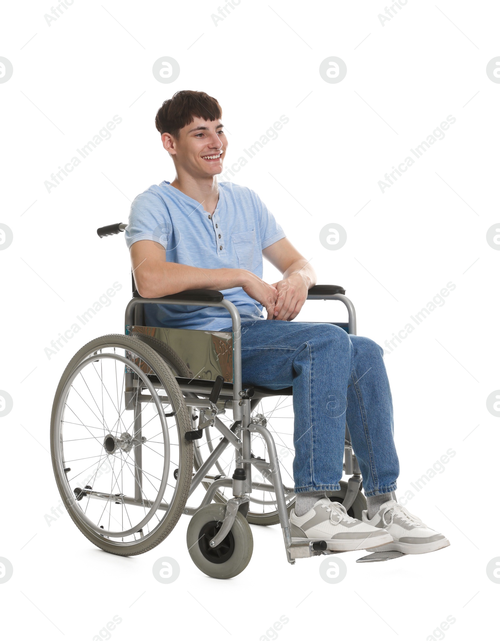 Photo of Happy young man in modern wheelchair on white background