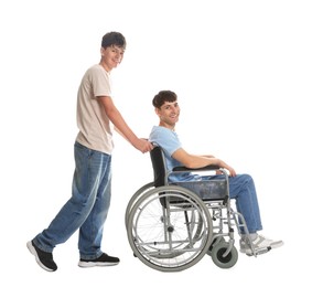 Photo of Happy young man in wheelchair and caregiver on white background