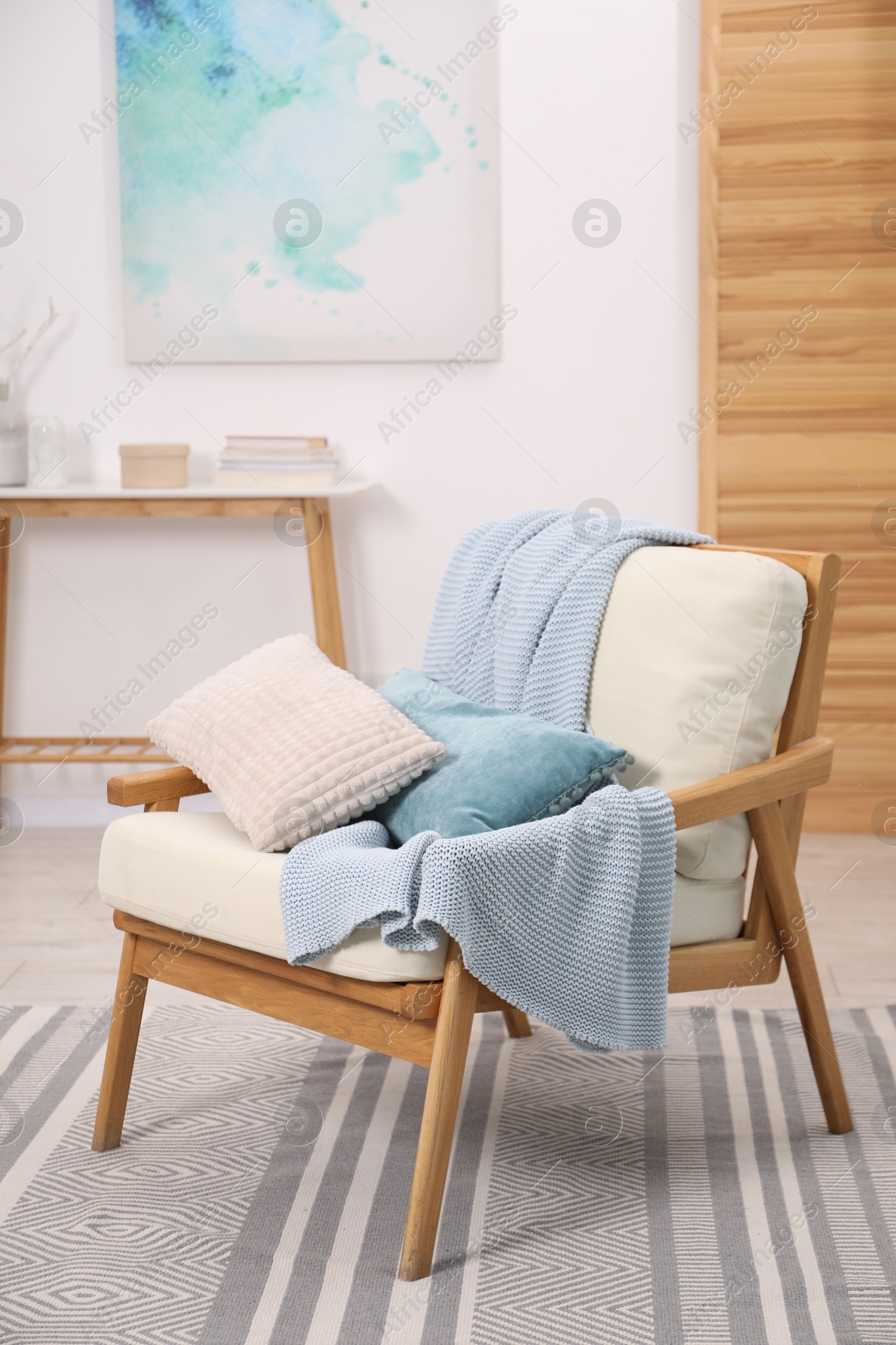 Photo of Comfortable armchair in living room. Interior design