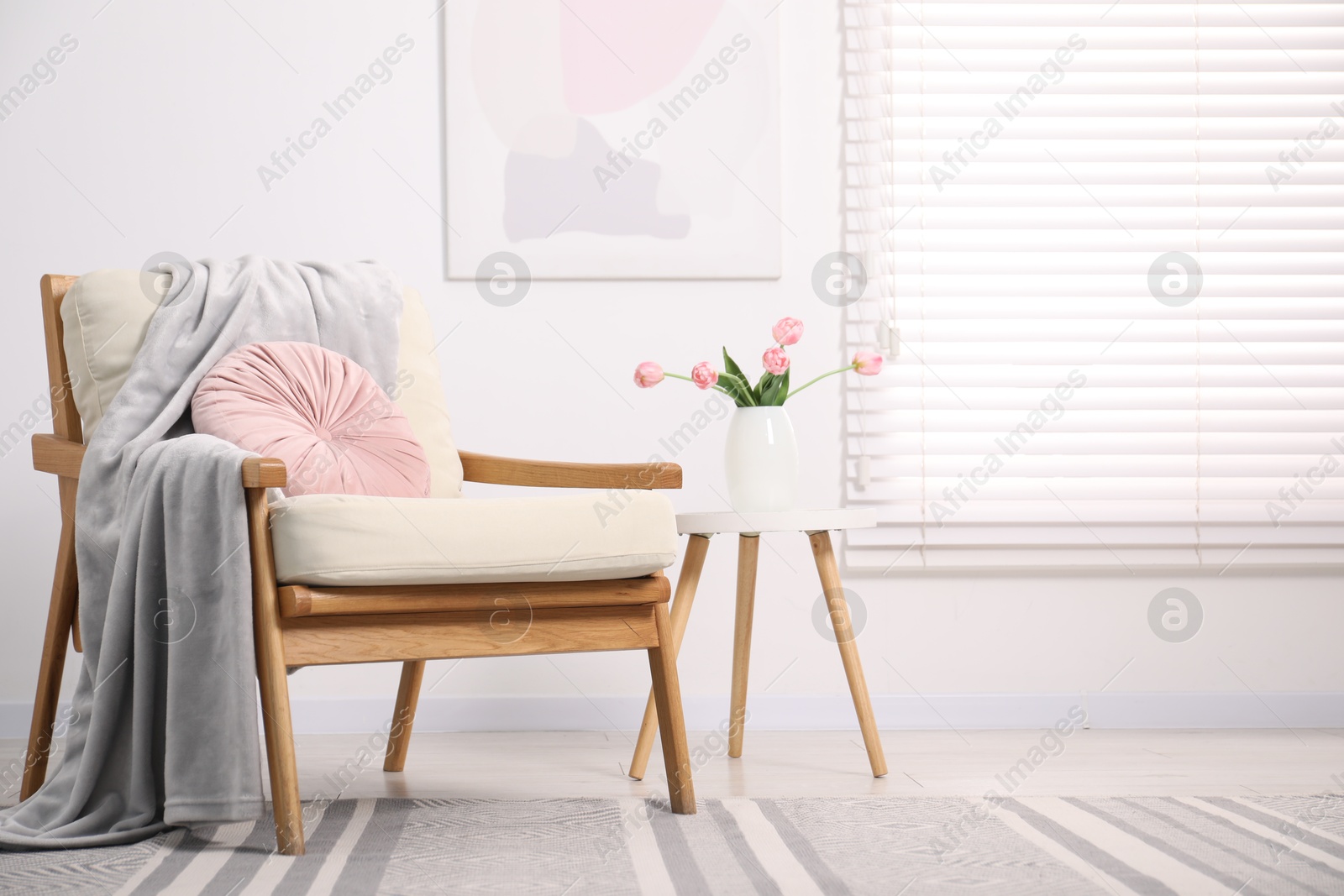 Photo of Comfortable armchair in living room. Interior design
