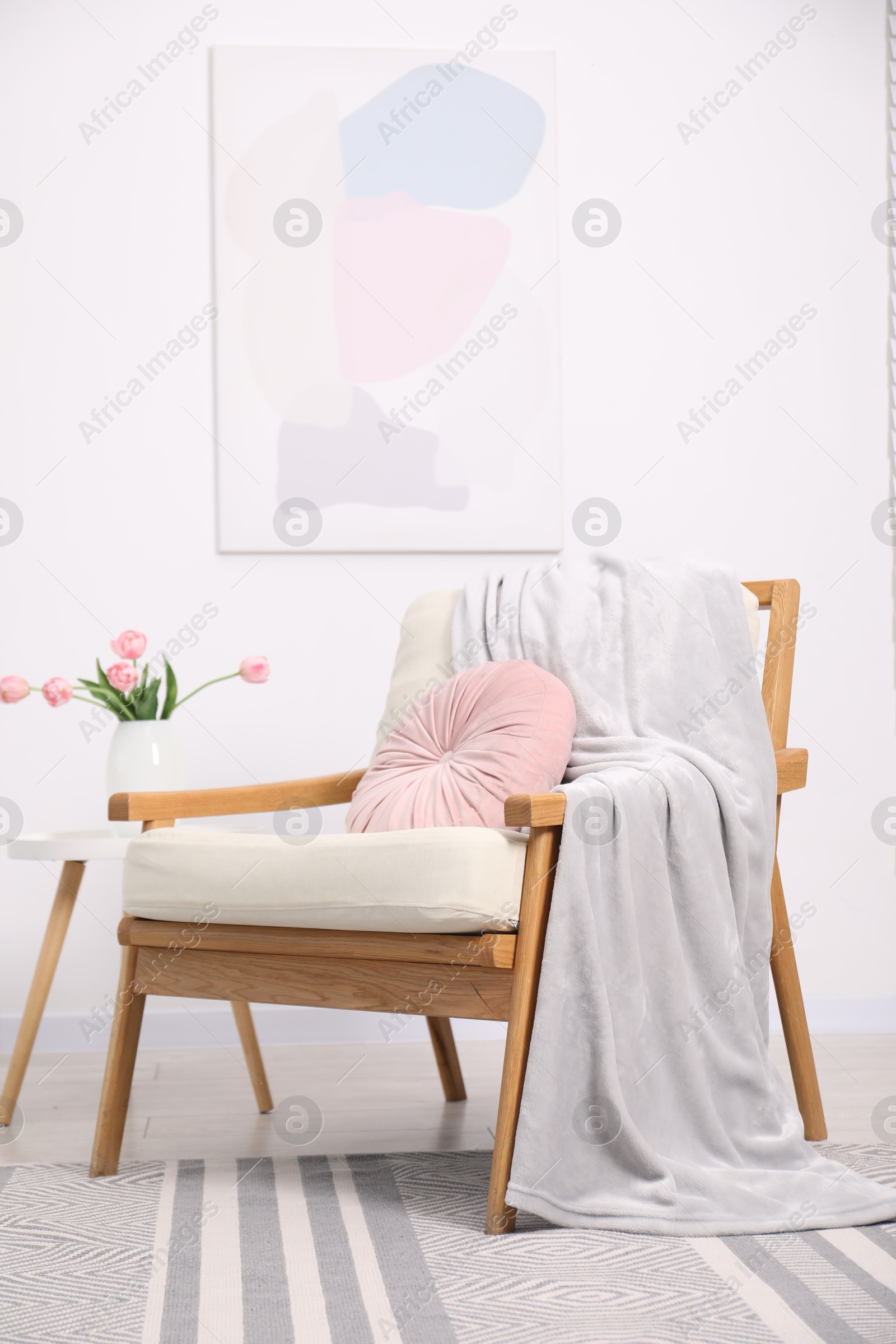 Photo of Comfortable armchair in living room. Interior design