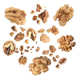 Image of Walnuts swirling in air against white background