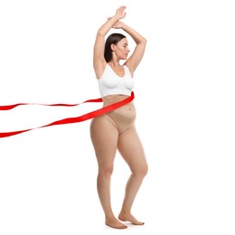 Image of Woman showing her body on white background, before and after. Collage divided by red ribbon demonstrating result of liposuction or weight loss