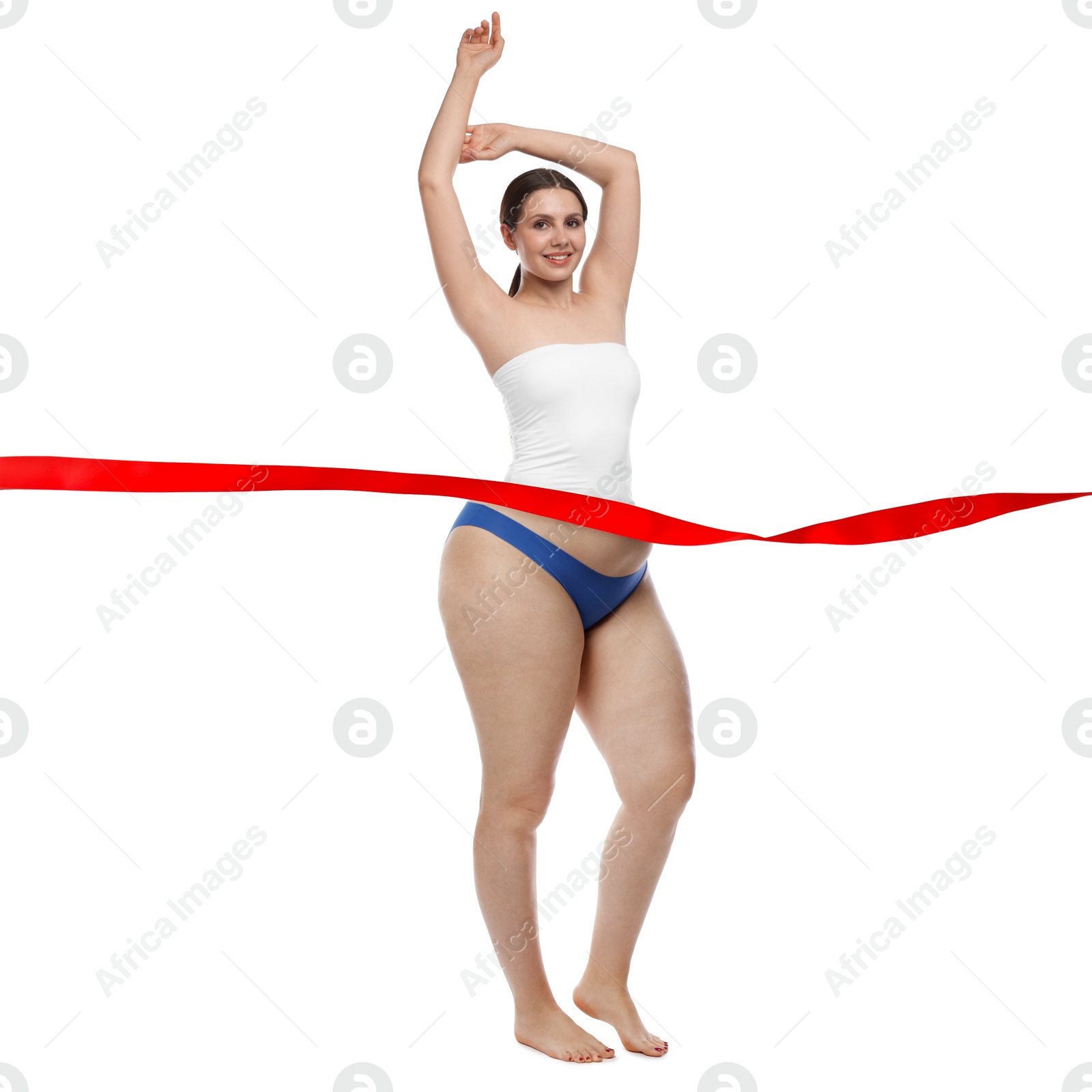 Woman showing her body on white background, before and after. Collage divided by red ribbon demonstrating result of liposuction or weight loss Image of Woman showing her body on white background, before and after. Collage divided by red ribbon demonstrating result of liposuction or weight loss