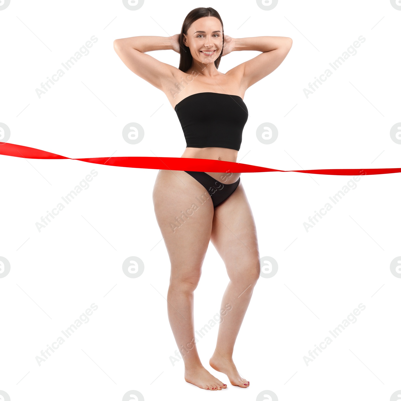 Woman showing her body on white background, before and after. Collage divided by red ribbon demonstrating result of liposuction or weight loss Image of Woman showing her body on white background, before and after. Collage divided by red ribbon demonstrating result of liposuction or weight loss