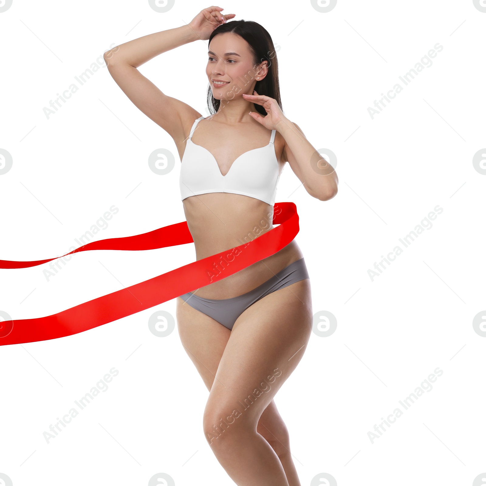 Woman showing her body on white background, before and after. Collage divided by red ribbon demonstrating result of liposuction or weight loss Image of Woman showing her body on white background, before and after. Collage divided by red ribbon demonstrating result of liposuction or weight loss