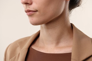 Photo of Woman with healthy skin on light background, closeup