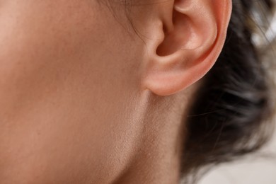 Photo of Closeup view of woman on light background