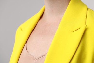 Photo of Closeup view of woman on grey background