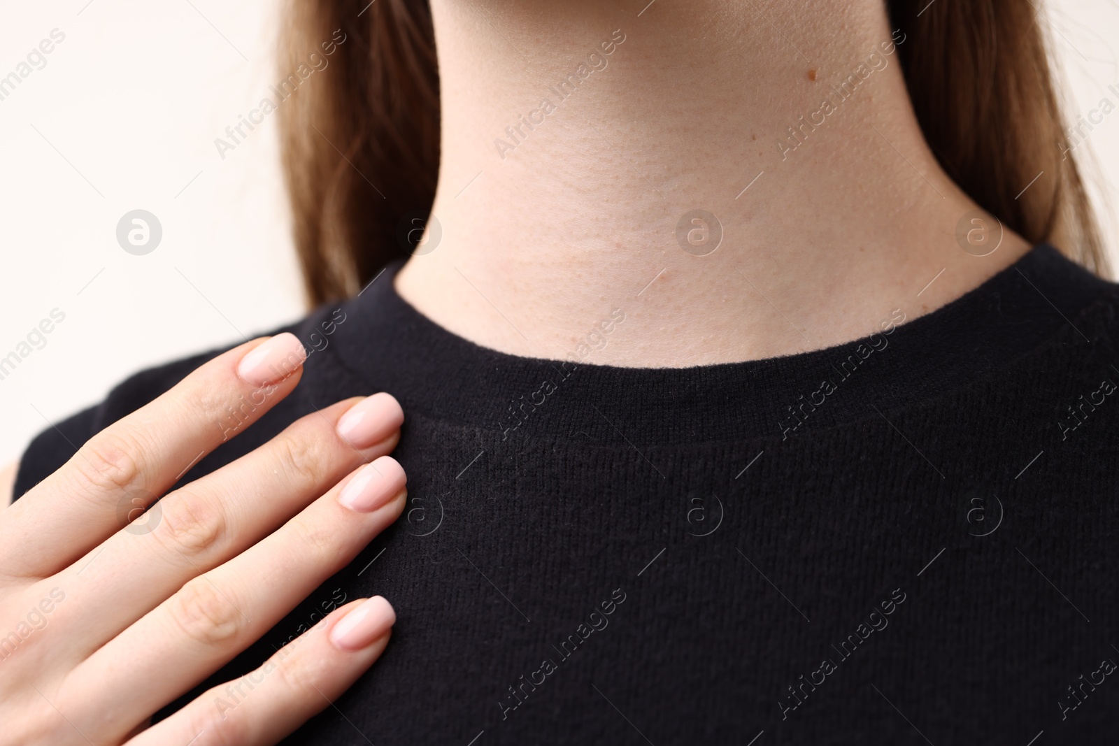 Photo of Closeup view of woman on light background