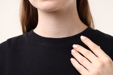 Photo of Closeup view of woman on light background