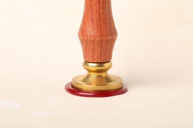 Photo of Sealing paper with wax stamp, closeup view