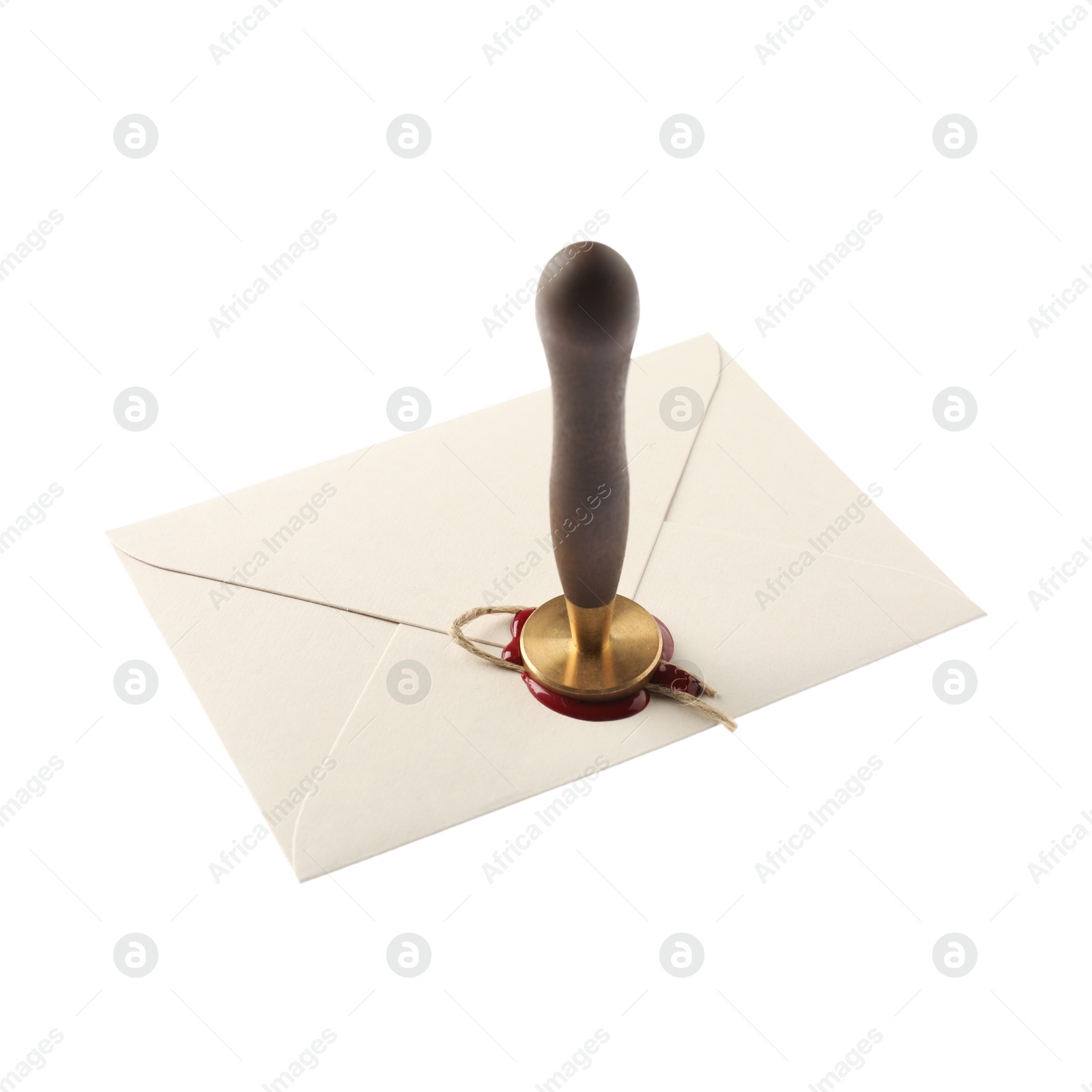 Sealing envelope with wax stamp isolated on white Photo of Sealing envelope with wax stamp isolated on white