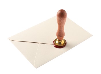 Photo of Sealing envelope with wax stamp isolated on white