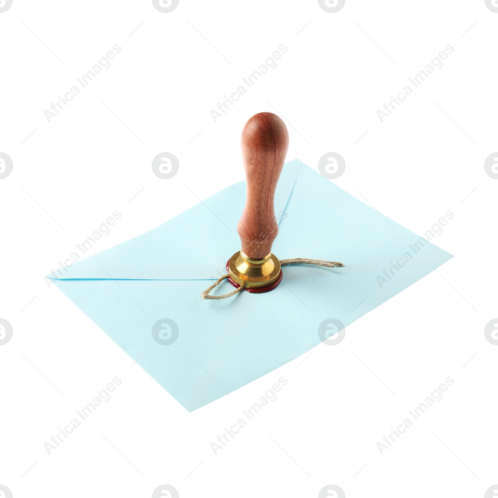 Sealing envelope with wax stamp isolated on white Photo of Sealing envelope with wax stamp isolated on white