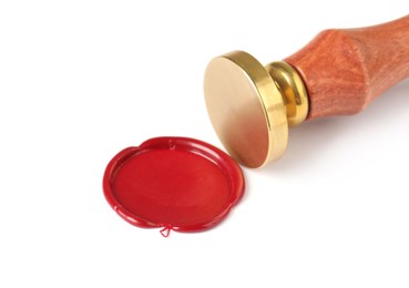 Photo of Beautiful wax stamp and red seal isolated on white