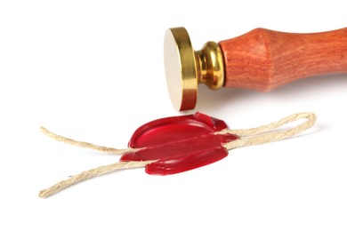 Photo of Beautiful wax stamp and red seal with twine isolated on white