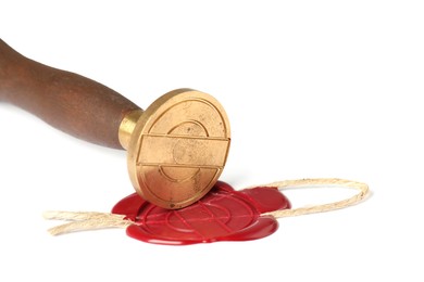 Photo of Beautiful wax stamp and red seal with twine isolated on white