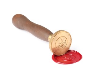 Photo of Beautiful wax stamp and red seal isolated on white