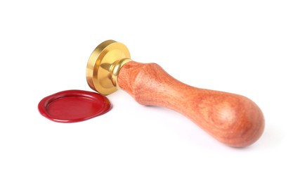 Photo of Beautiful wax stamp and red seal isolated on white