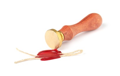 Photo of Beautiful wax stamp and red seal with twine isolated on white