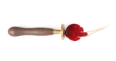 Photo of Beautiful wax stamp and red seal with twine isolated on white, top view