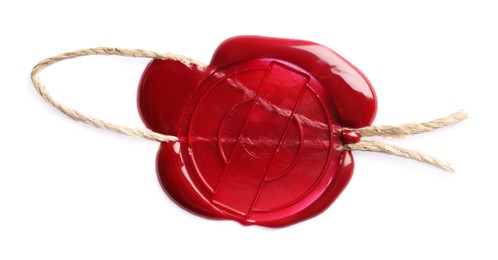 Photo of Red wax seal with twine isolated on white, top view