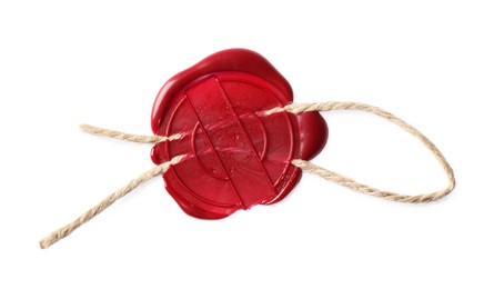Photo of Red wax seal with twine isolated on white, top view