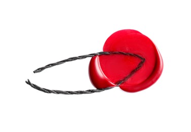 Photo of Red wax seal with twine isolated on white, top view