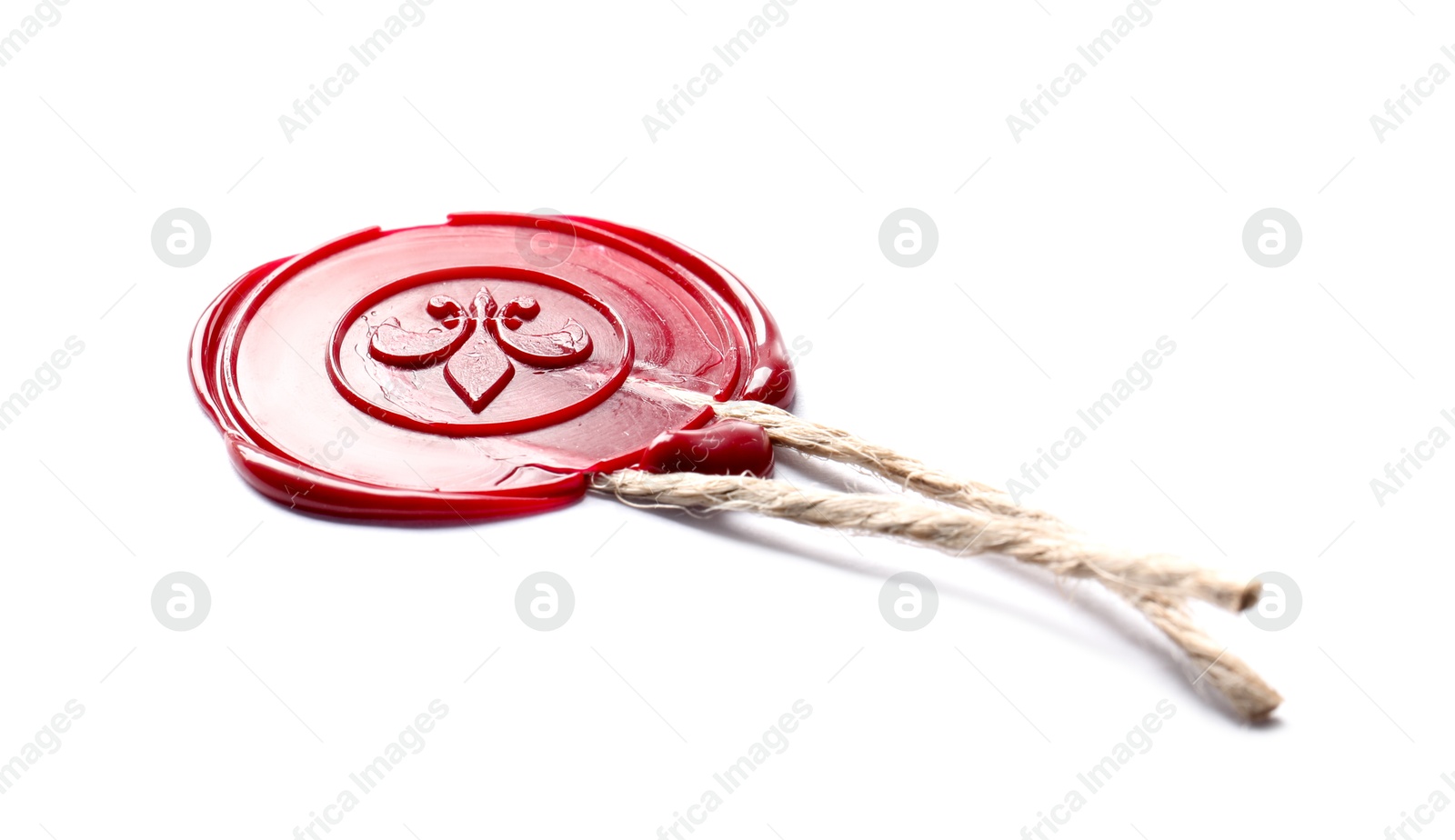 Red wax seal with twine isolated on white Photo of Red wax seal with twine isolated on white