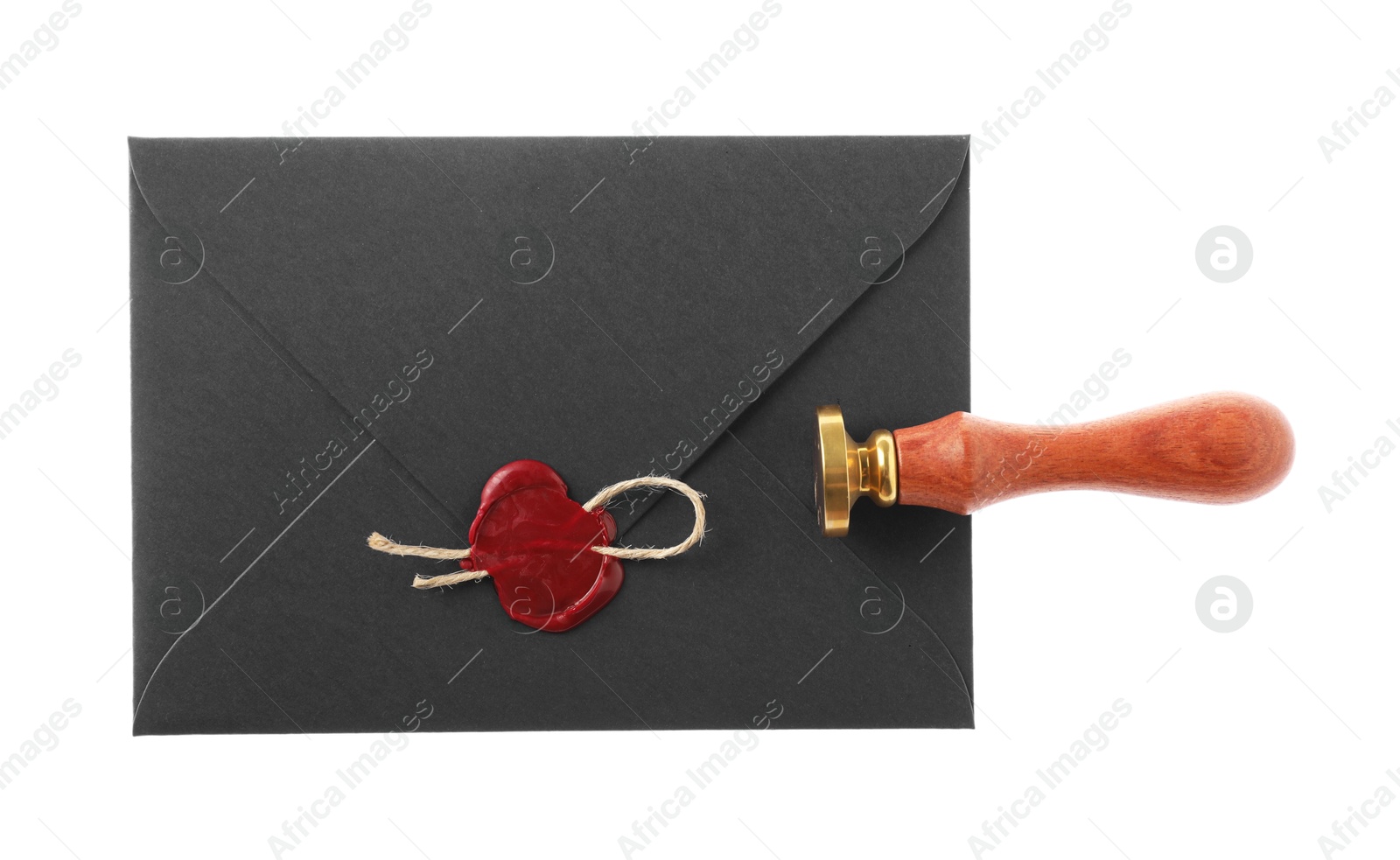 Wax stamp and black envelope with seal isolated on white, top view Photo of Wax stamp and black envelope with seal isolated on white, top view