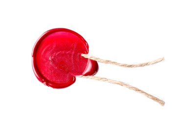 Photo of Red wax seal with twine isolated on white, top view