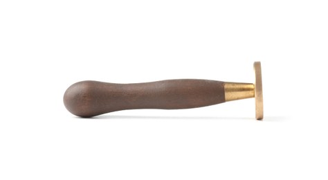 Photo of One wax stamp with wooden handle isolated on white